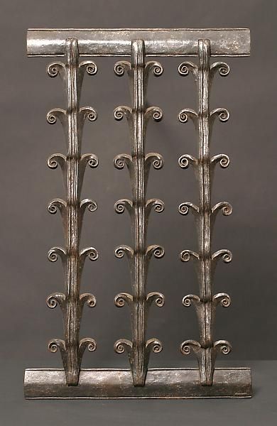 Wrought iron three-panel screen with scrolling leaf motifs