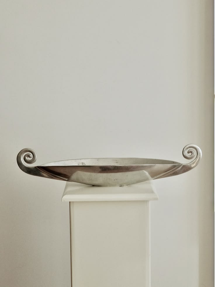 Vintage silver centerpiece bowl with scrolled swirl handles